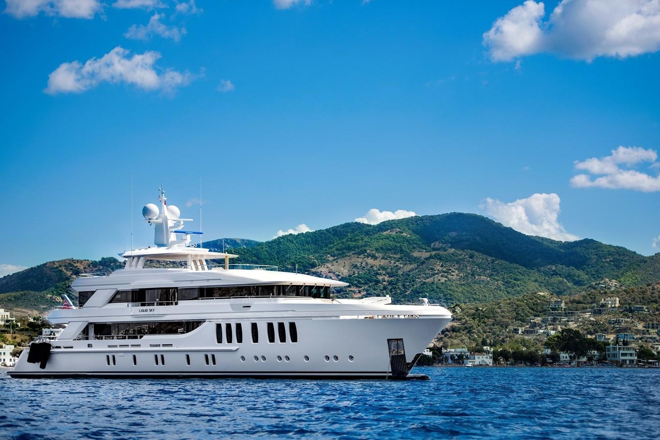 a white boat on water aboard CMB 47 SERIES Yacht for Sale