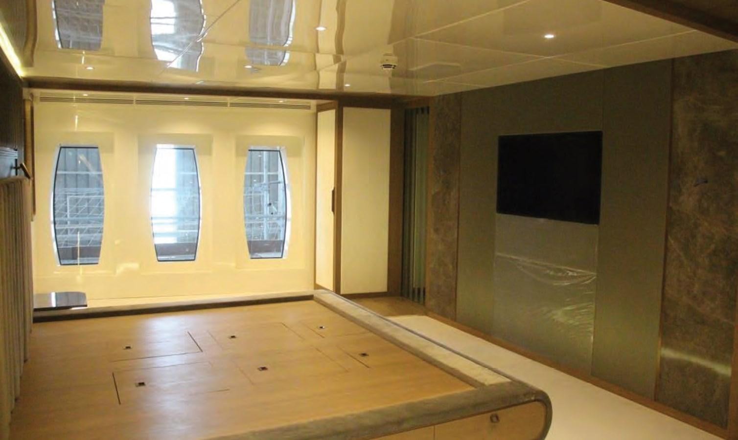 a room with a large window aboard HULL#05 Yacht for Sale