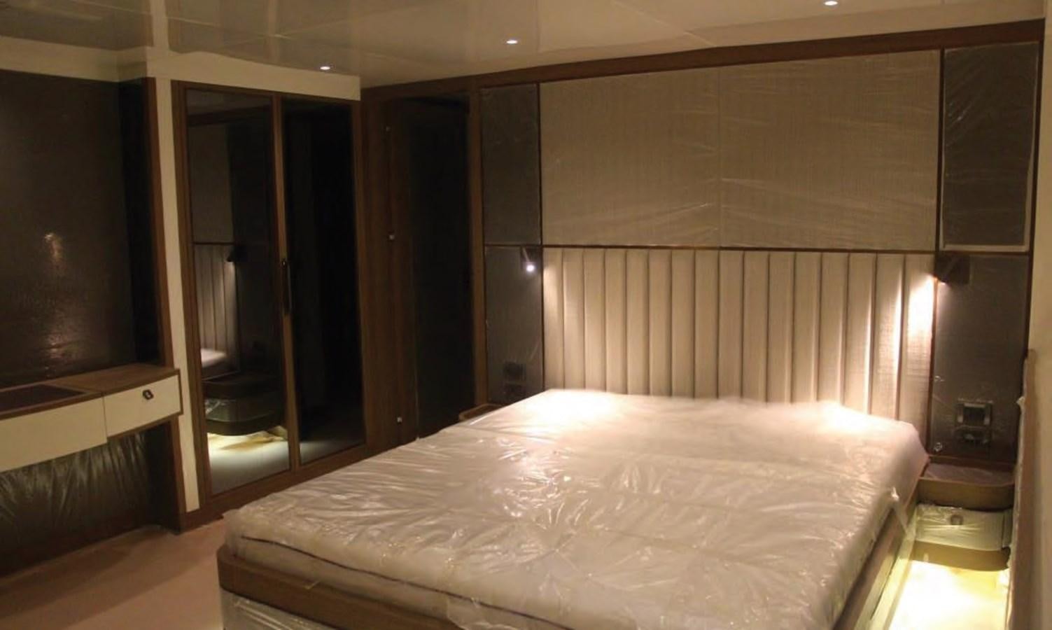 a bed in a room aboard HULL#05 Yacht for Sale