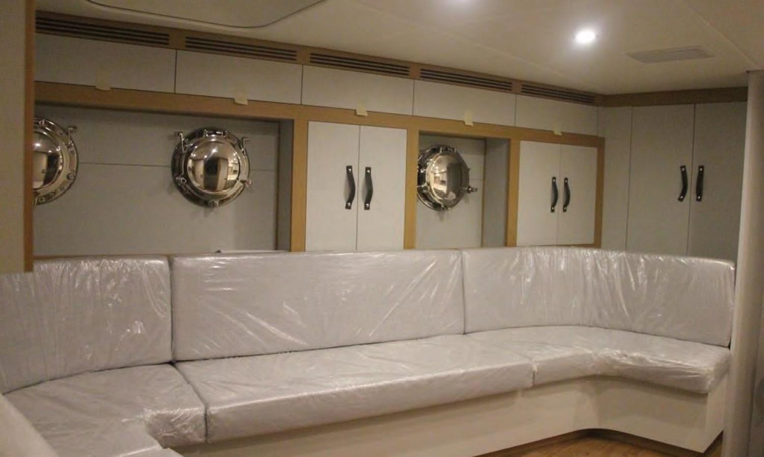 a bathtub with a mirror above it aboard HULL#05 Yacht for Sale