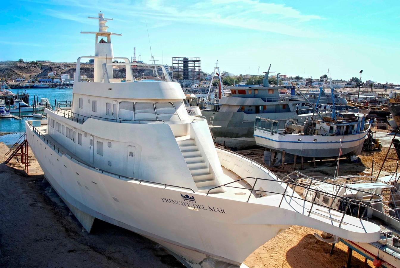 a boat docked at a pier aboard PRINCIPE DEL MAR Yacht for Sale