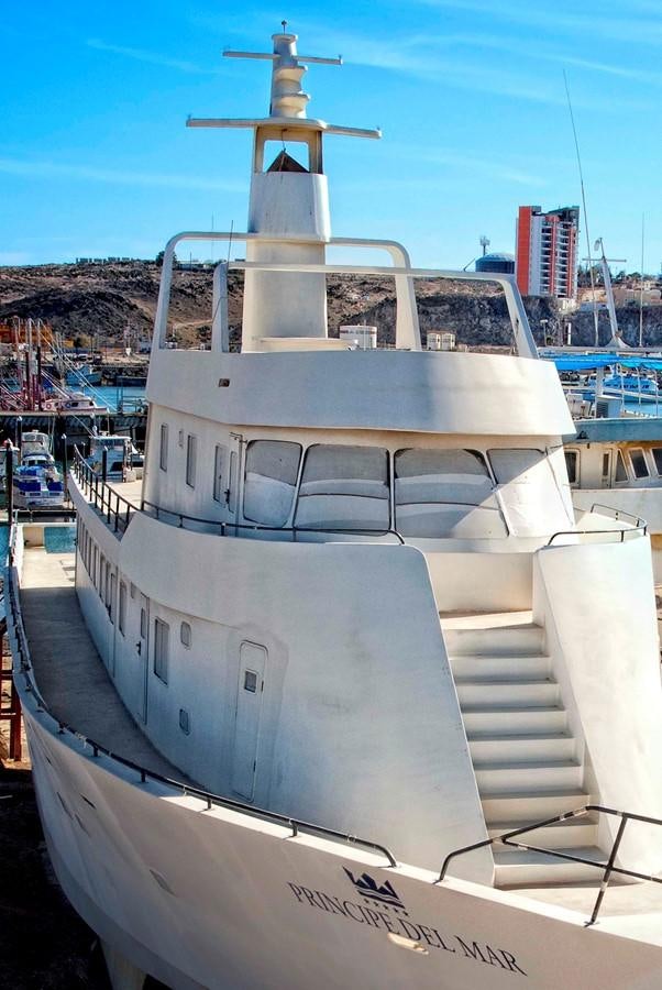 a large ship in a harbor aboard PRINCIPE DEL MAR Yacht for Sale