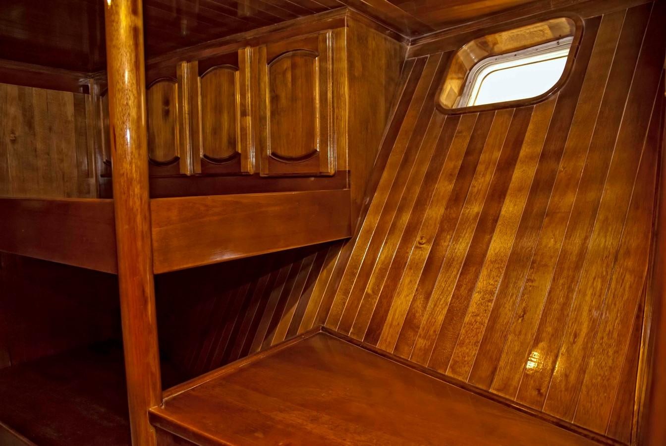 a wooden room with wooden walls aboard PRINCIPE DEL MAR Yacht for Sale