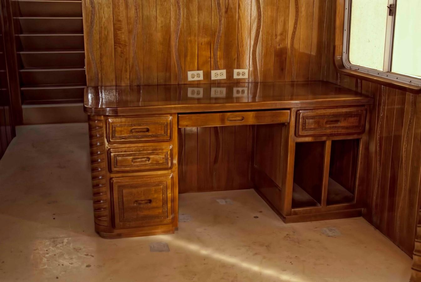 a wooden cabinet in a room aboard PRINCIPE DEL MAR Yacht for Sale