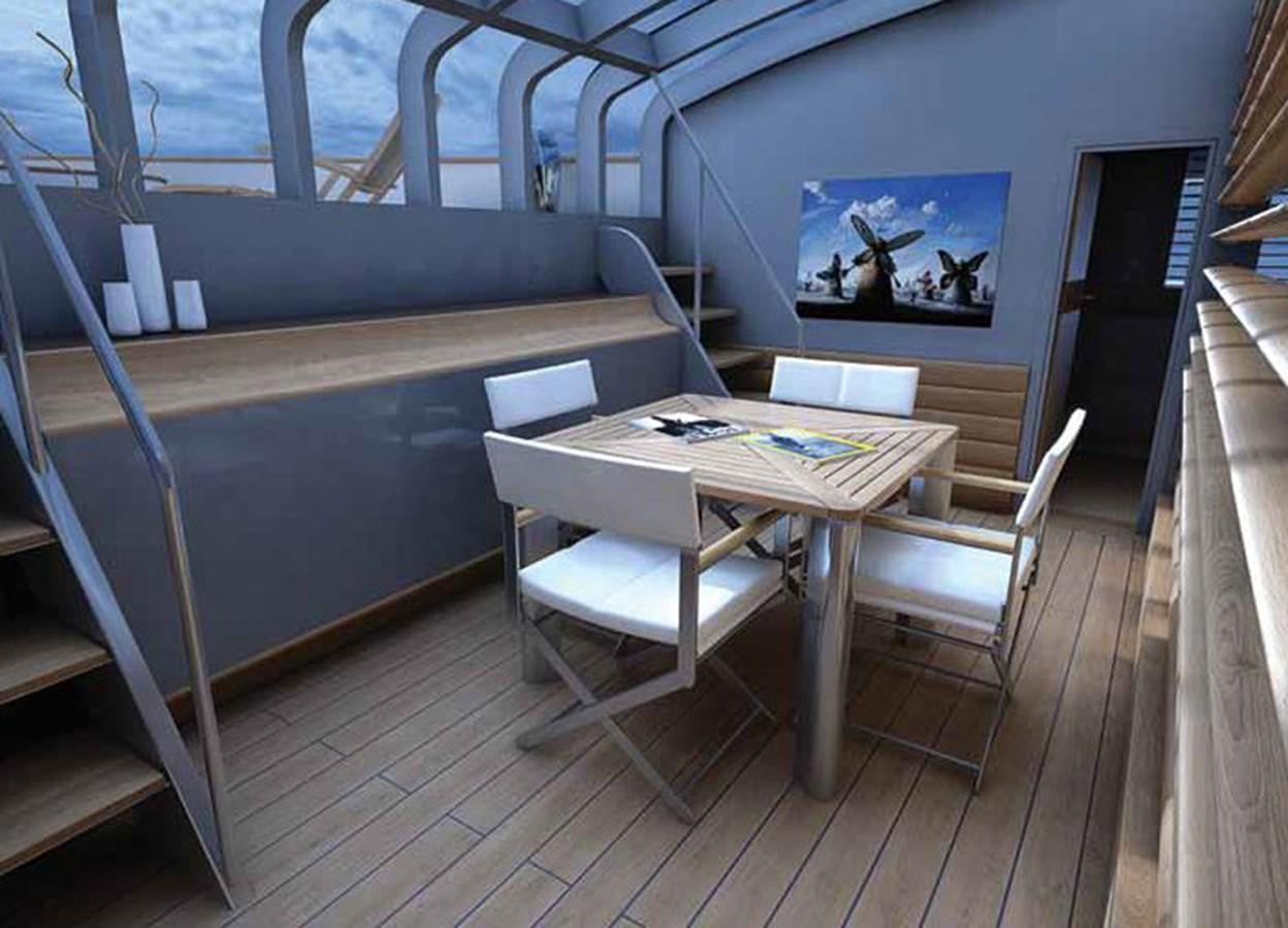 a table and chairs on a deck aboard SM45  AMERIGO Yacht for Sale