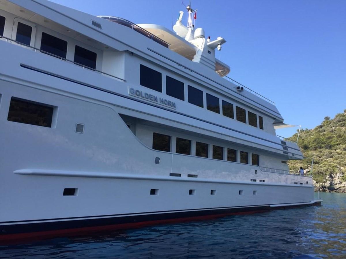 a large white boat aboard GOLDEN HORN Yacht for Sale