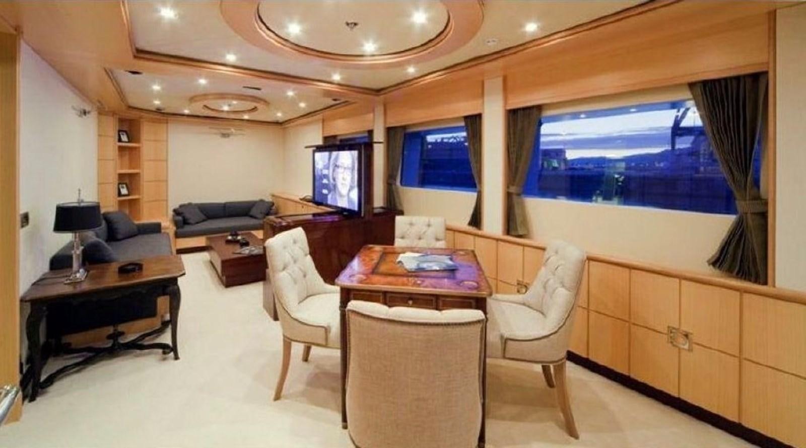 a room with a bed and a desk aboard GOLDEN HORN Yacht for Sale