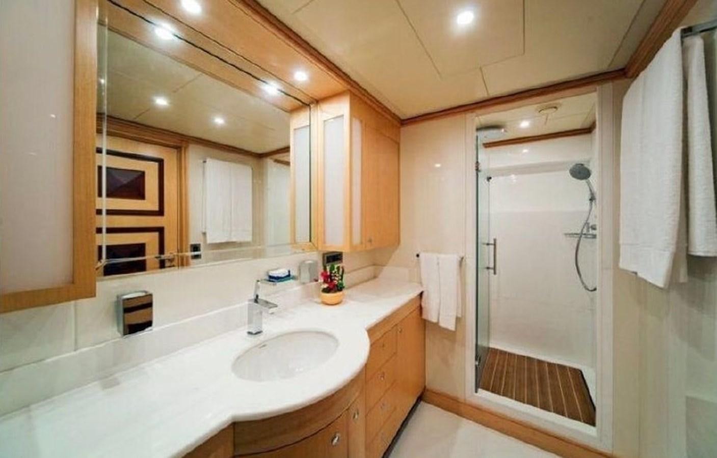 a bathroom with a large mirror aboard GOLDEN HORN Yacht for Sale