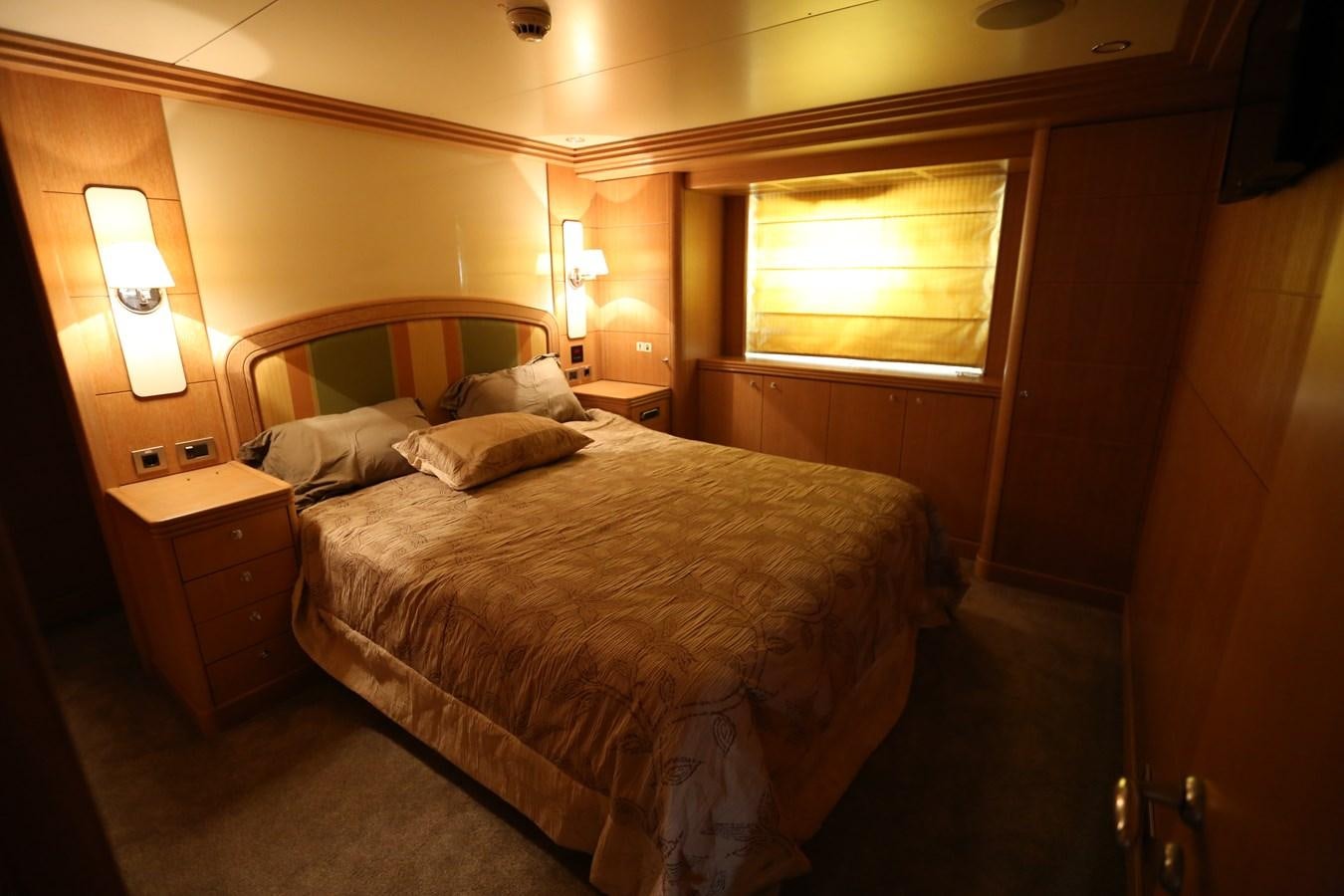 a bed in a room aboard GOODWILL Yacht for Sale