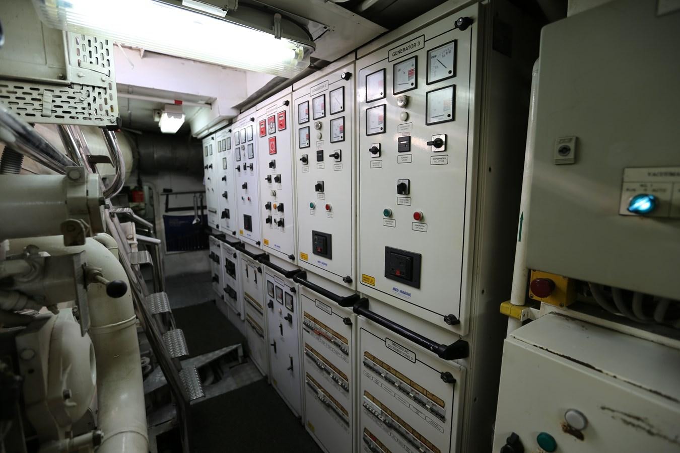 a room with several white machines aboard GOODWILL Yacht for Sale