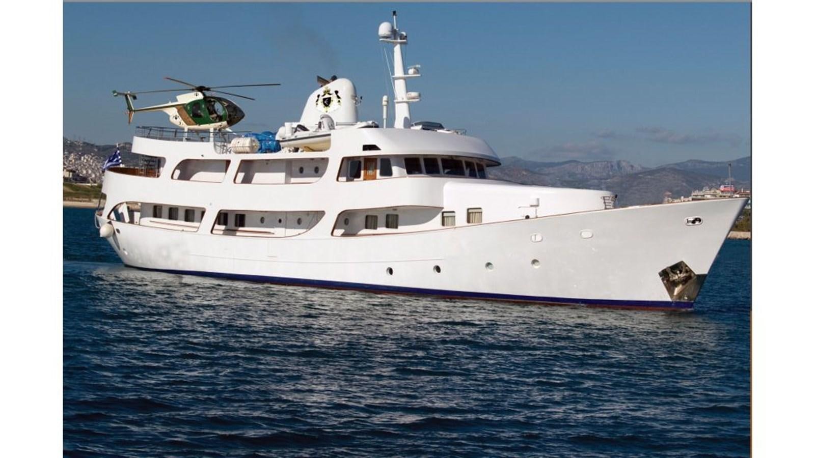 a large white boat in the water aboard ELIKI Yacht for Sale