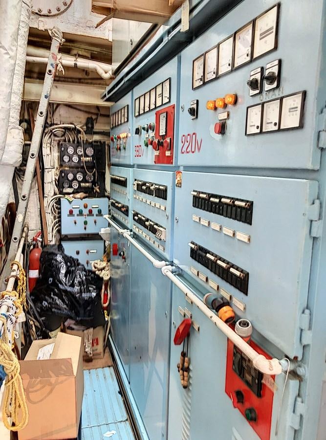 a room with many electronic devices aboard ELIKI Yacht for Sale