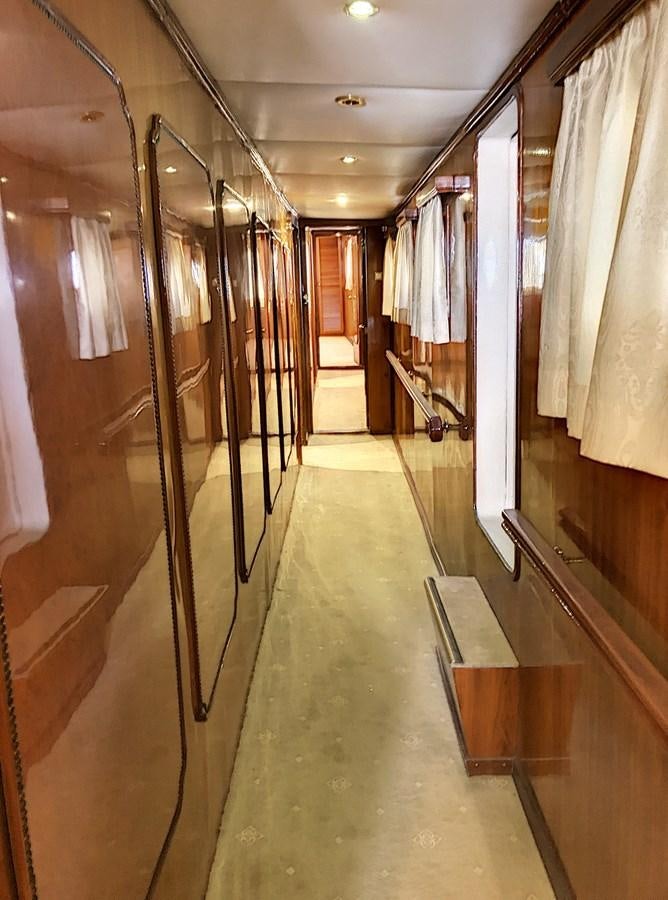 a hallway with a row of lockers aboard ELIKI Yacht for Sale