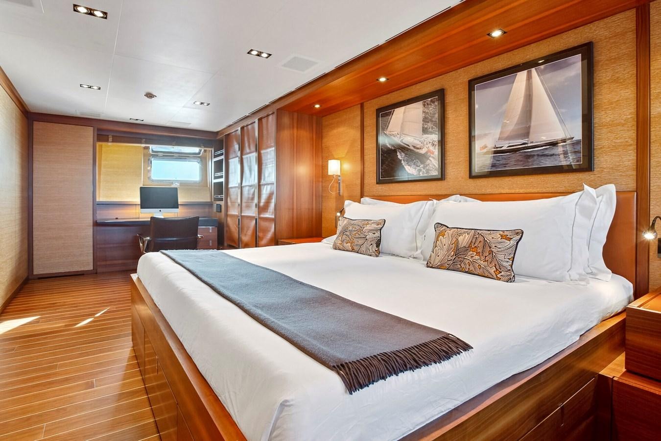 a large bed in a room aboard STATE OF GRACE Yacht for Sale
