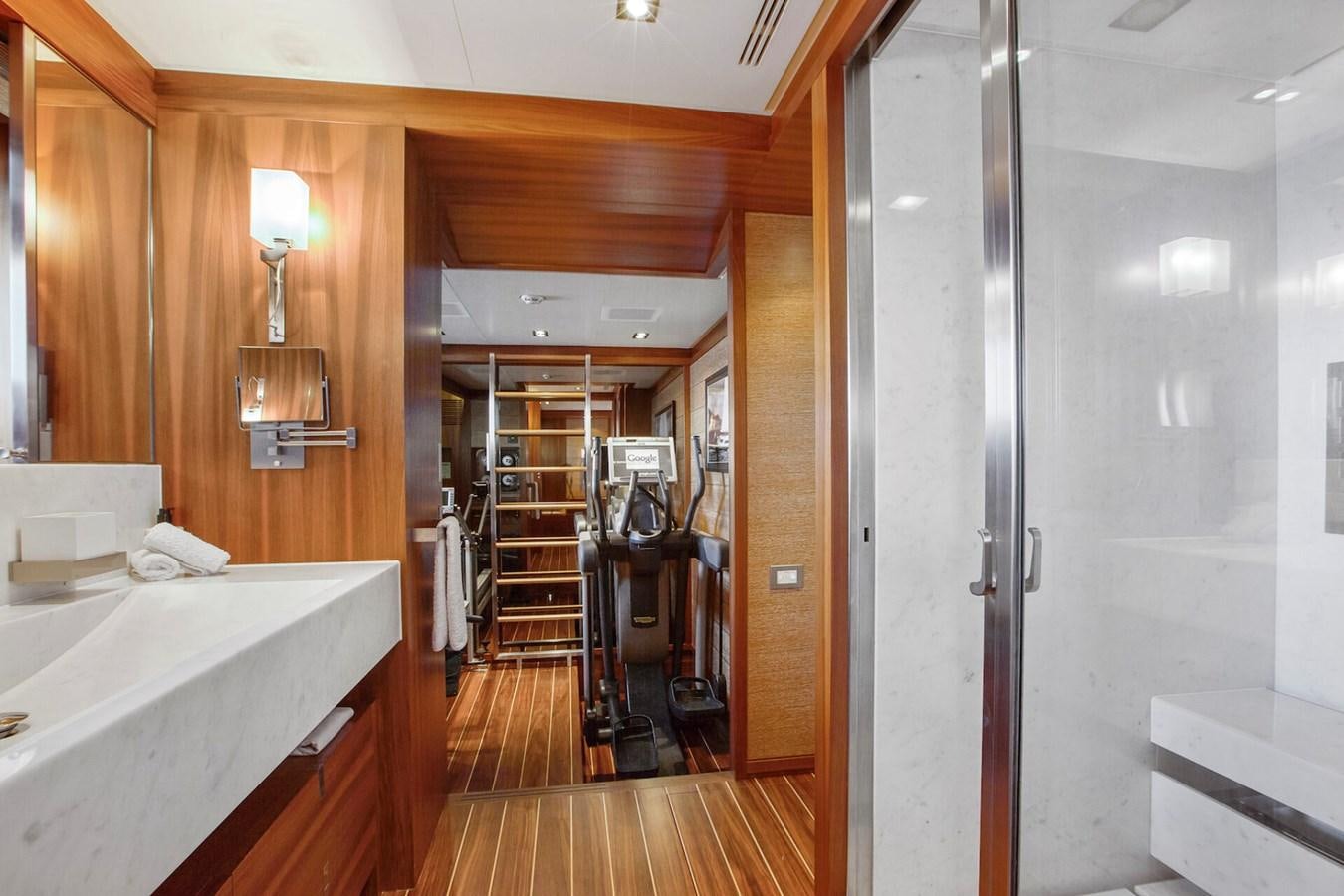 a bathroom with a large sink and a large mirror aboard STATE OF GRACE Yacht for Sale