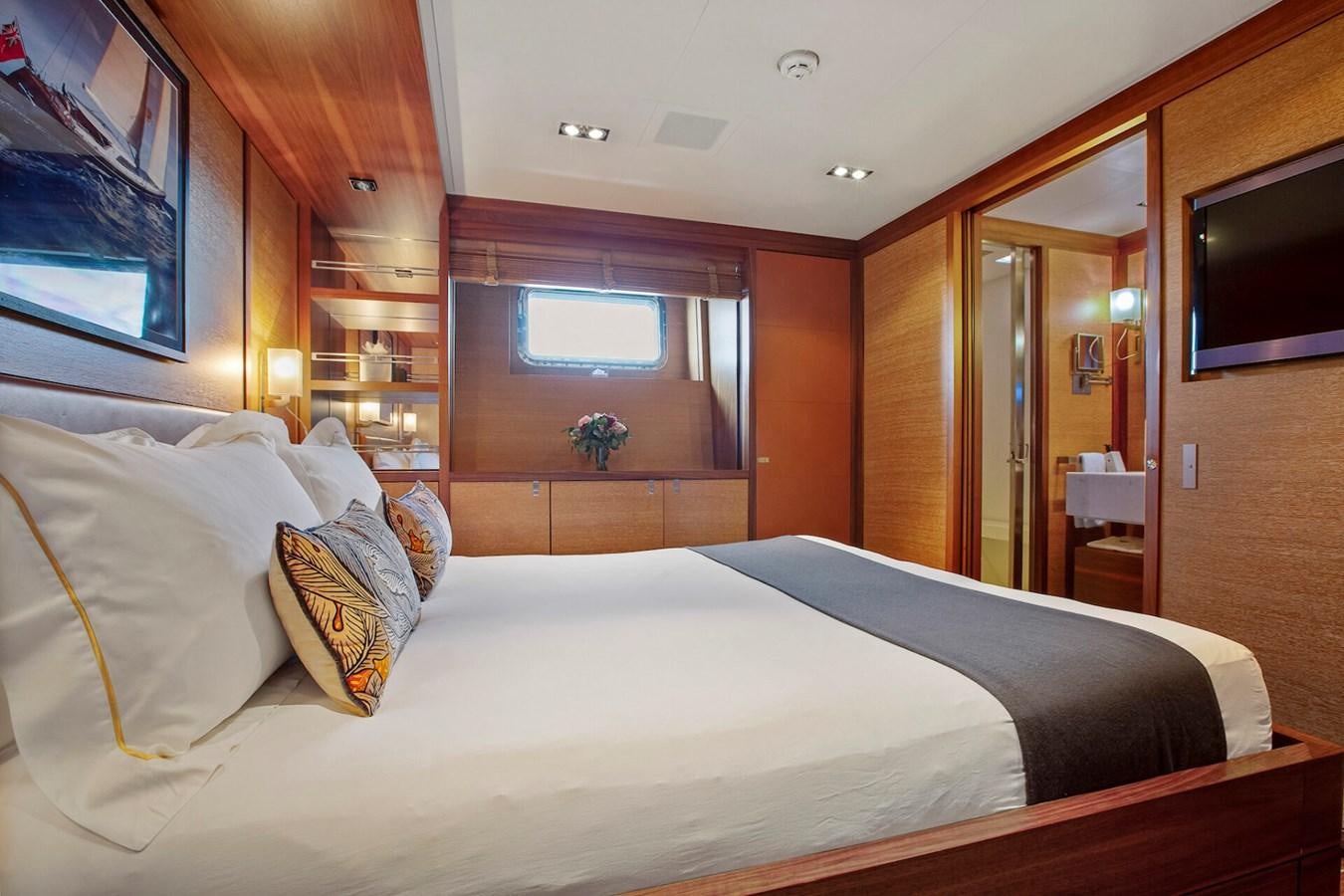 a bed with pillows aboard STATE OF GRACE Yacht for Sale
