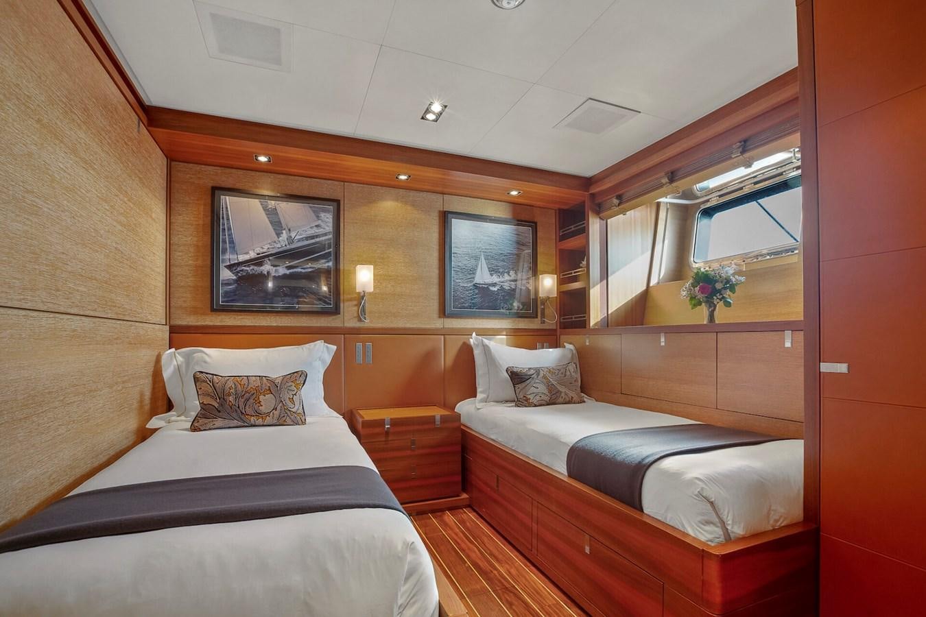 a room with two beds aboard STATE OF GRACE Yacht for Sale