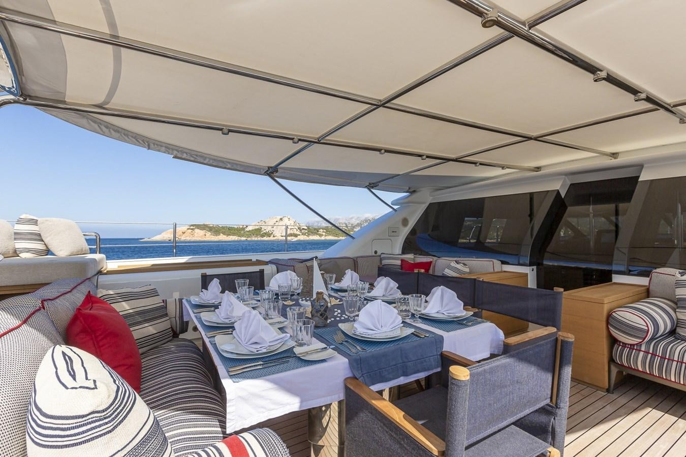 a boat with tables and chairs aboard STATE OF GRACE Yacht for Sale