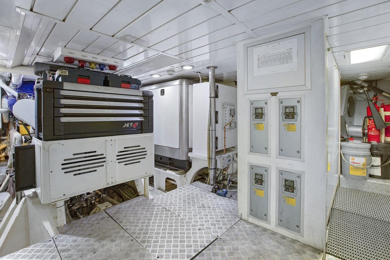 a large machine in a room aboard STATE OF GRACE Yacht for Sale