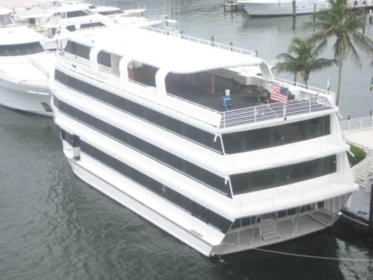 a boat docked at a pier aboard SIR WINSTON Yacht for Sale