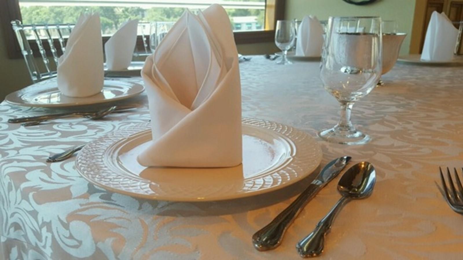 a white vase on a plate aboard SIR WINSTON Yacht for Sale