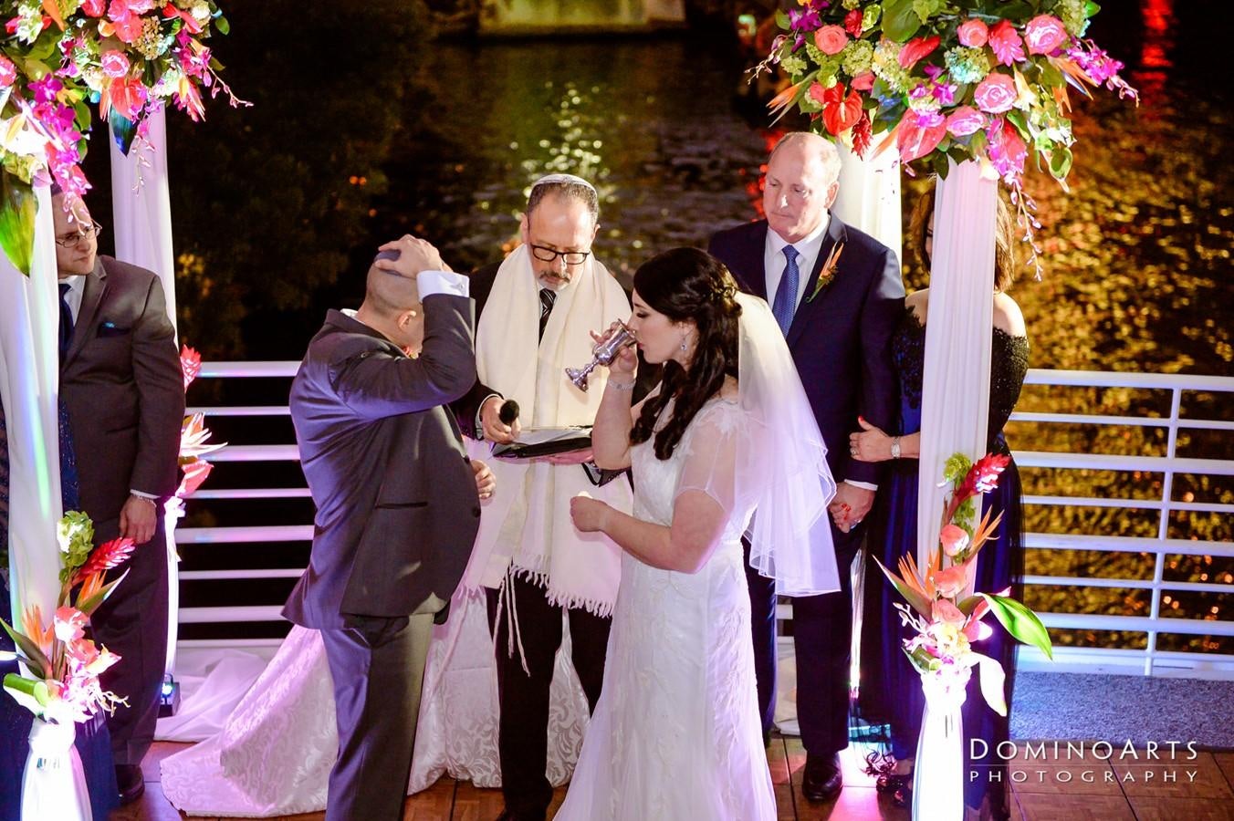 a man and woman in wedding attire aboard SIR WINSTON Yacht for Sale