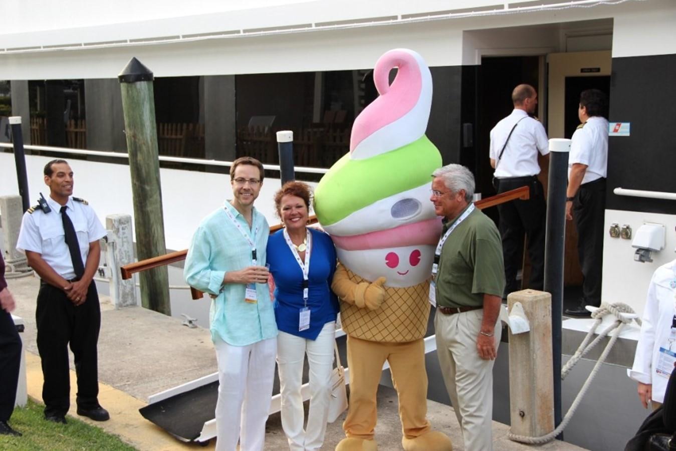 a group of people standing next to a robot aboard SIR WINSTON Yacht for Sale