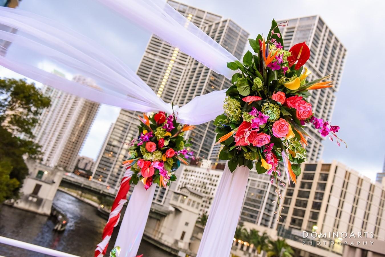 a building with a tall building with a tree in the front aboard SIR WINSTON Yacht for Sale