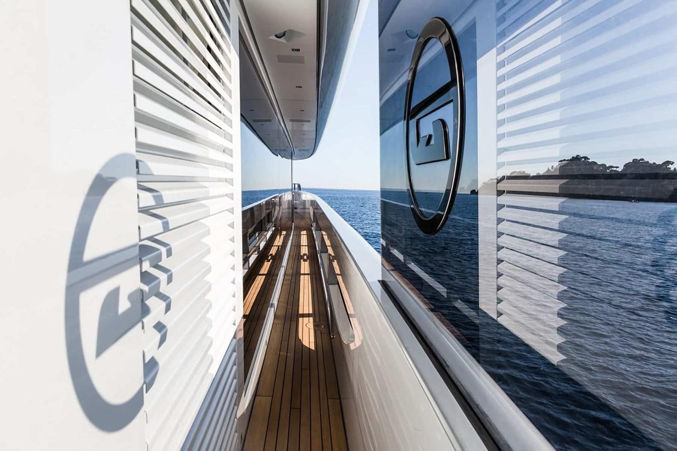 a boat with a large wooden deck aboard GTT 130 Yacht for Sale
