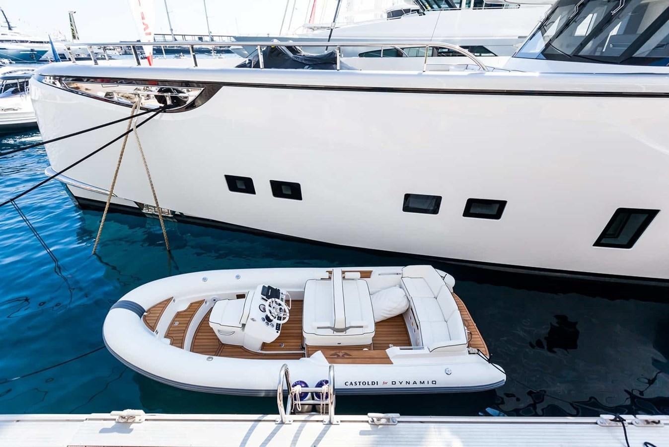 a boat parked on the shore aboard GTT 130 Yacht for Sale