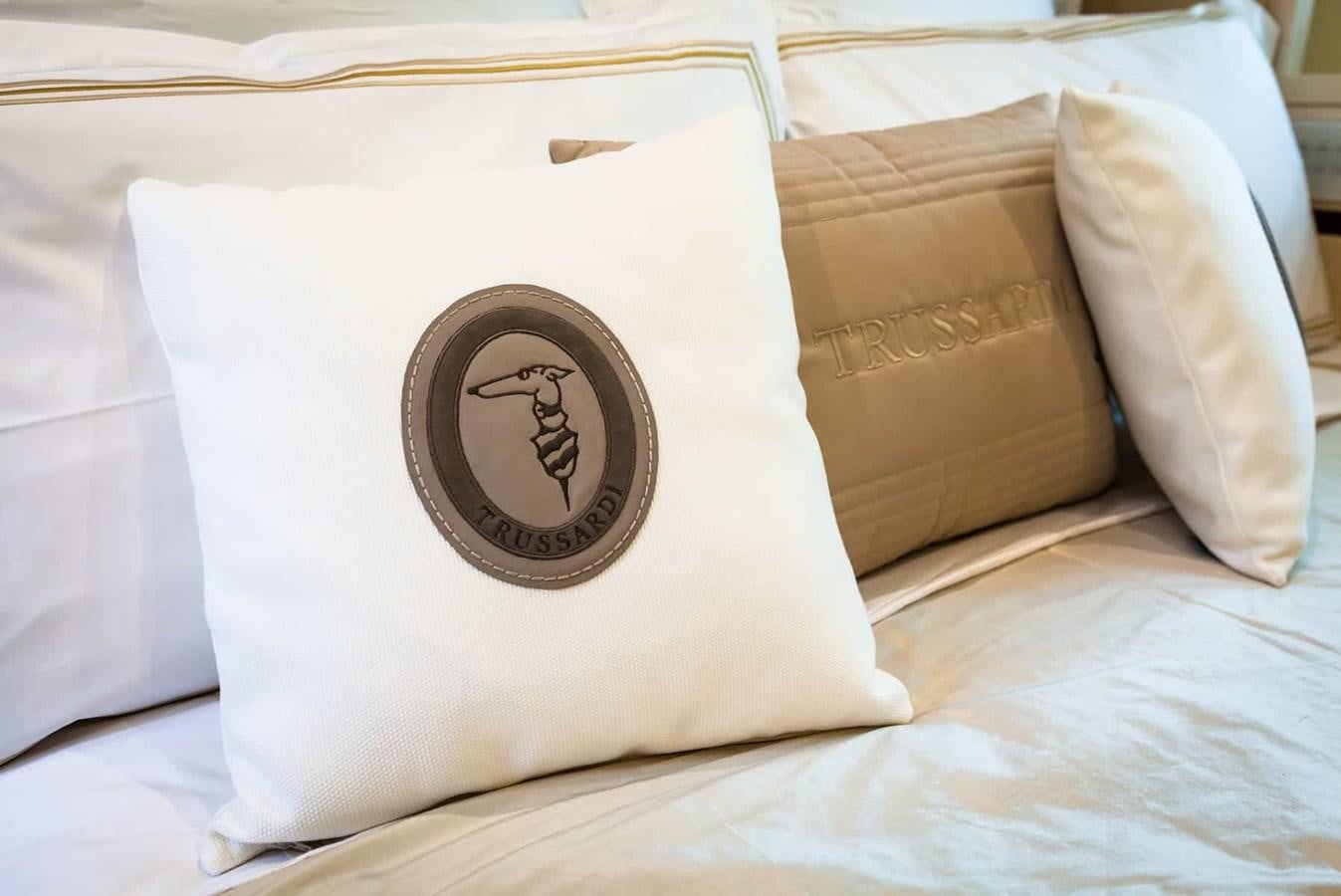 a box on a bed aboard GTT 130 Yacht for Sale