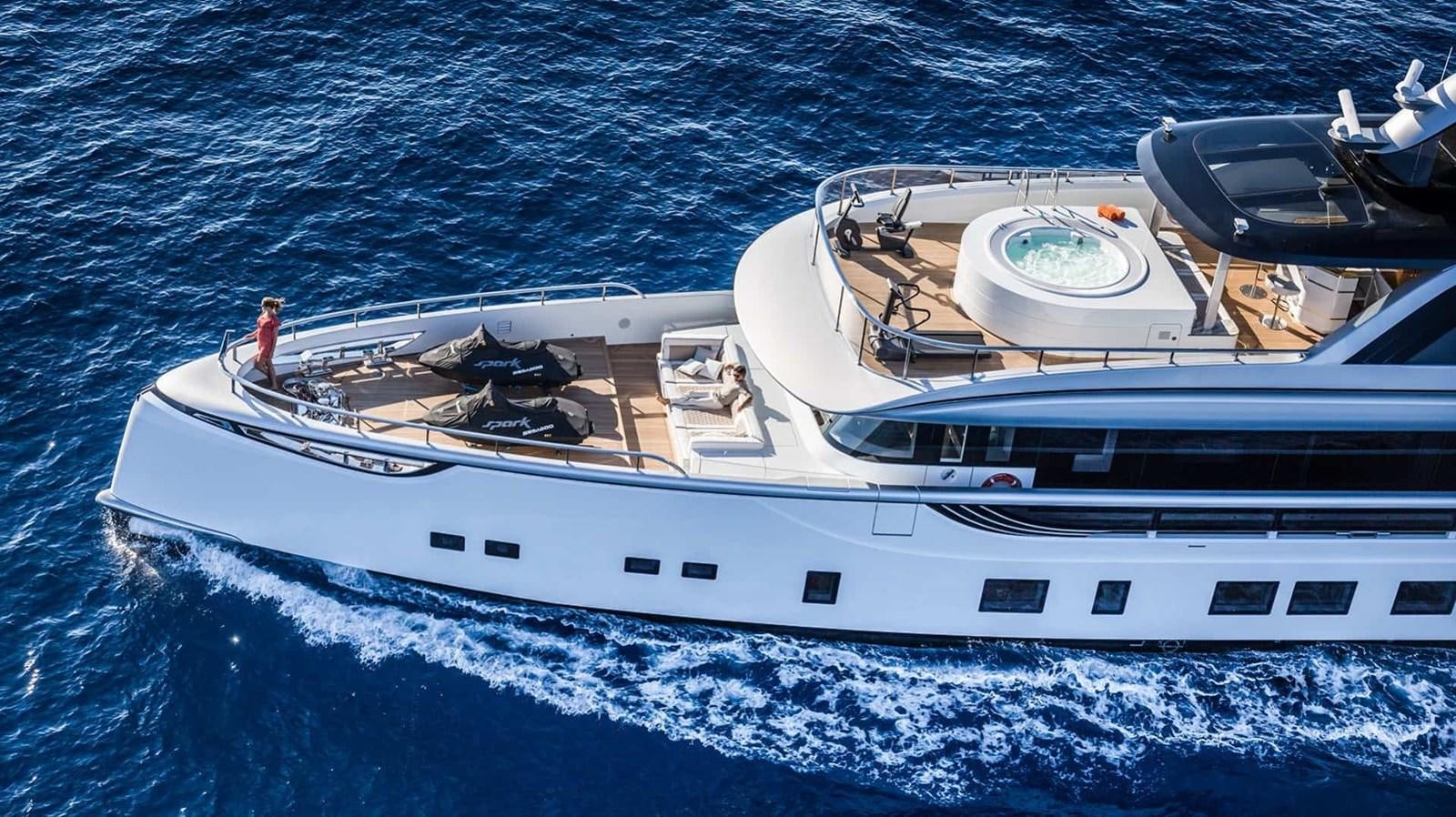a white boat in the water aboard GTT 130 Yacht for Sale