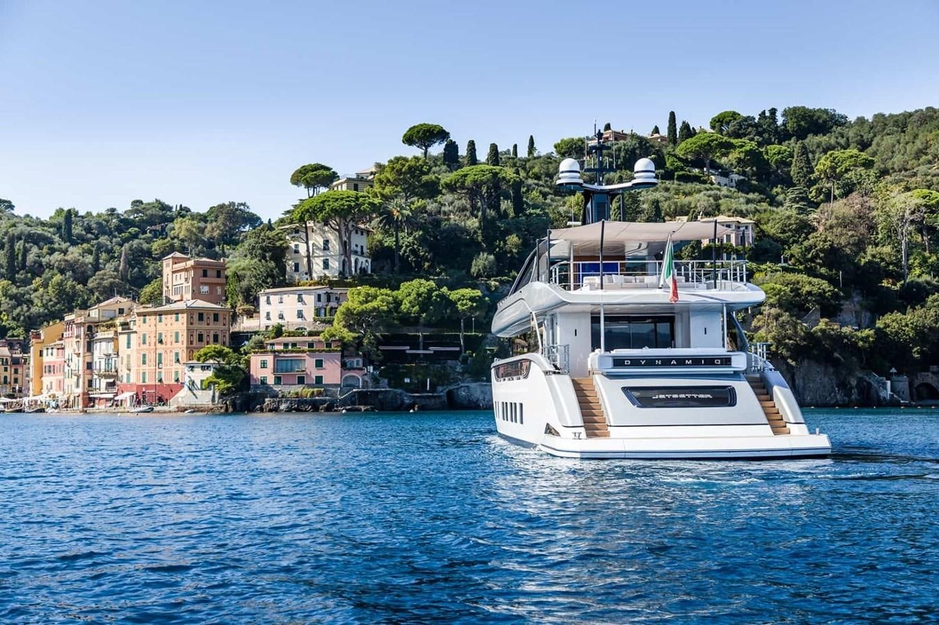 a boat on the water aboard GTT 130 Yacht for Sale