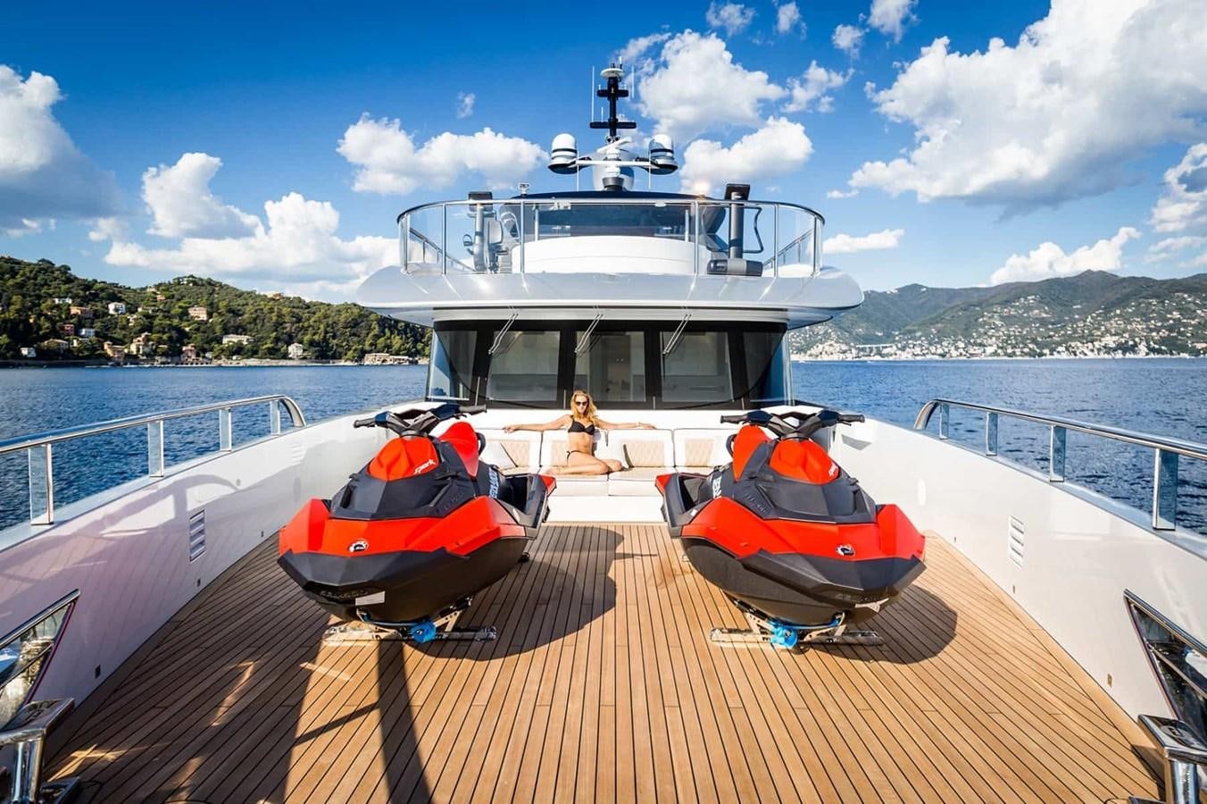 a couple of boats on a dock aboard GTT 130 Yacht for Sale