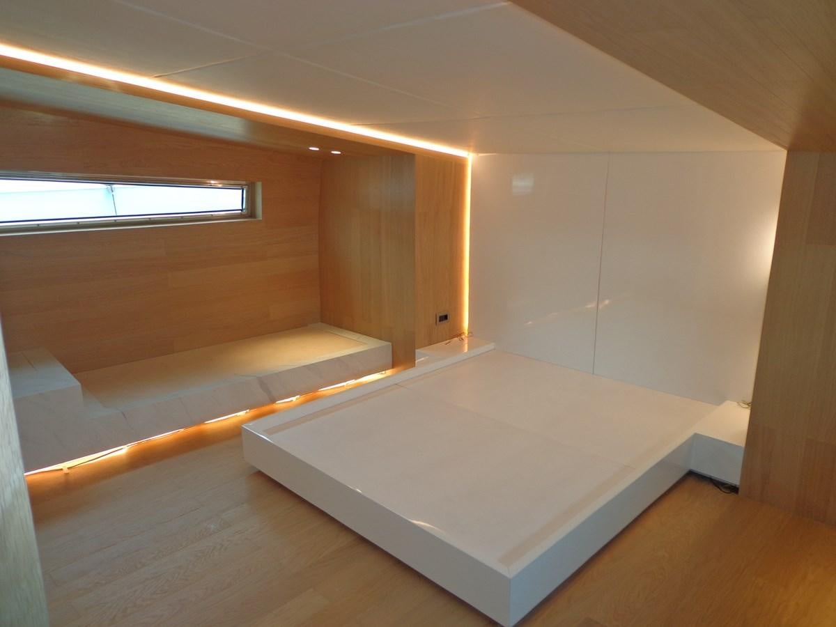 a room with a large window aboard SHAMEKH Yacht for Sale