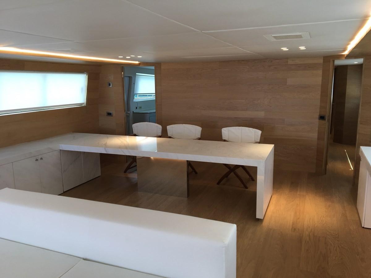 a room with a bed and a desk aboard SHAMEKH Yacht for Sale