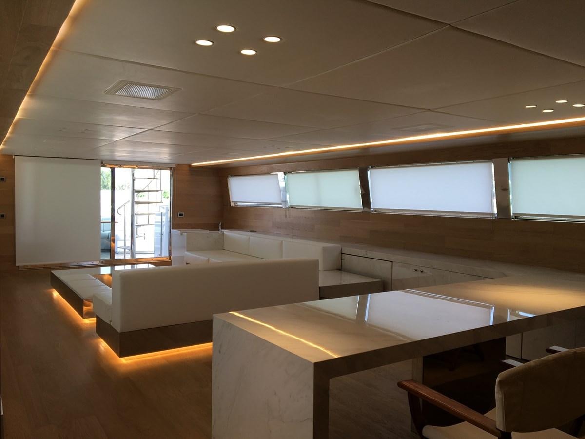 a room with a couch and a table aboard SHAMEKH Yacht for Sale