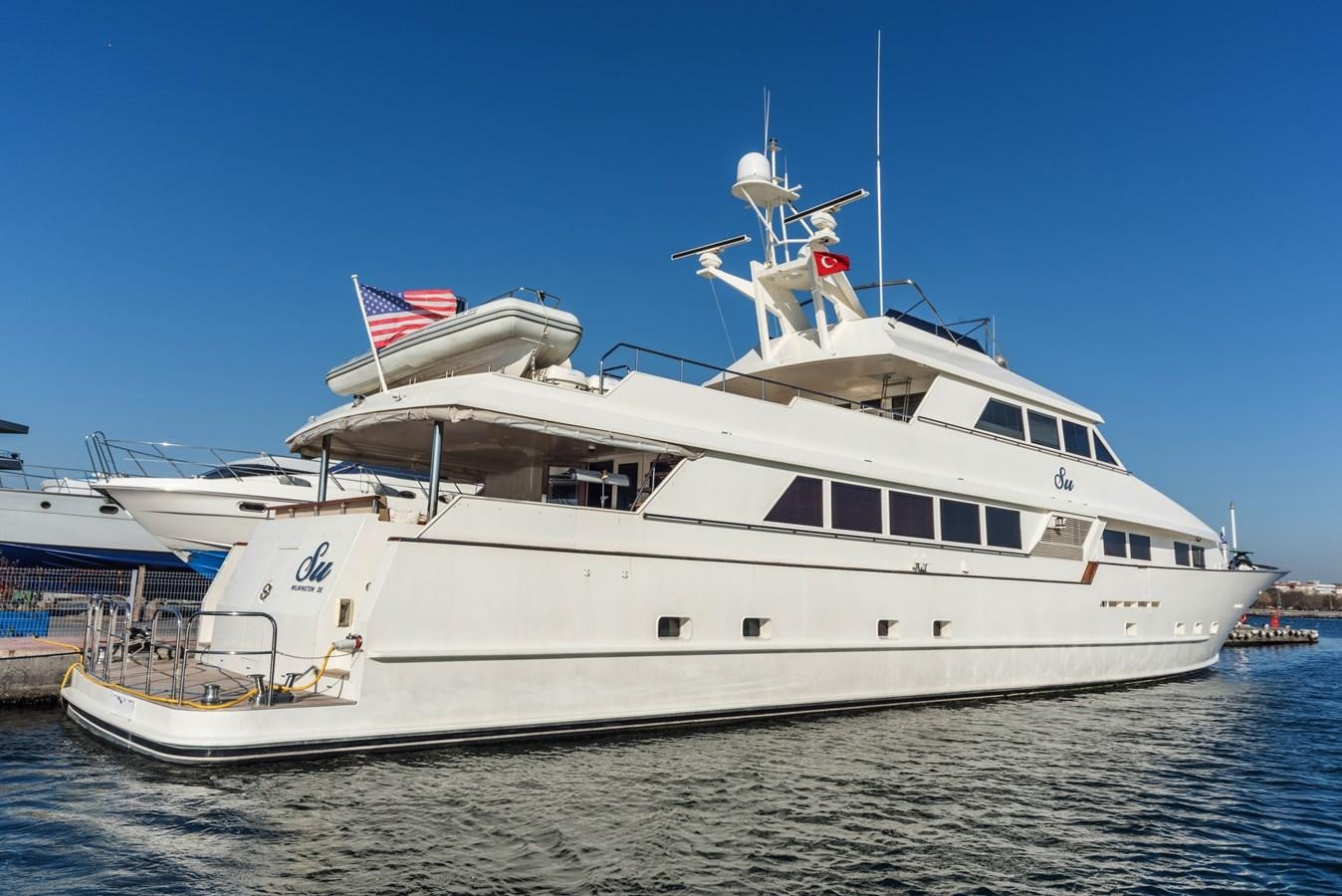 a large white ship aboard SU Yacht for Sale