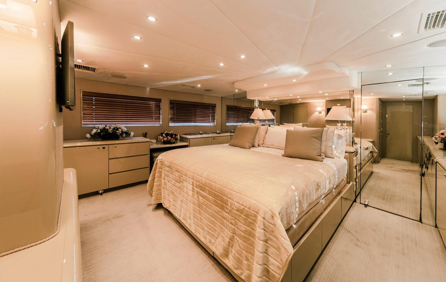 a large bedroom with a large bed aboard SU Yacht for Sale
