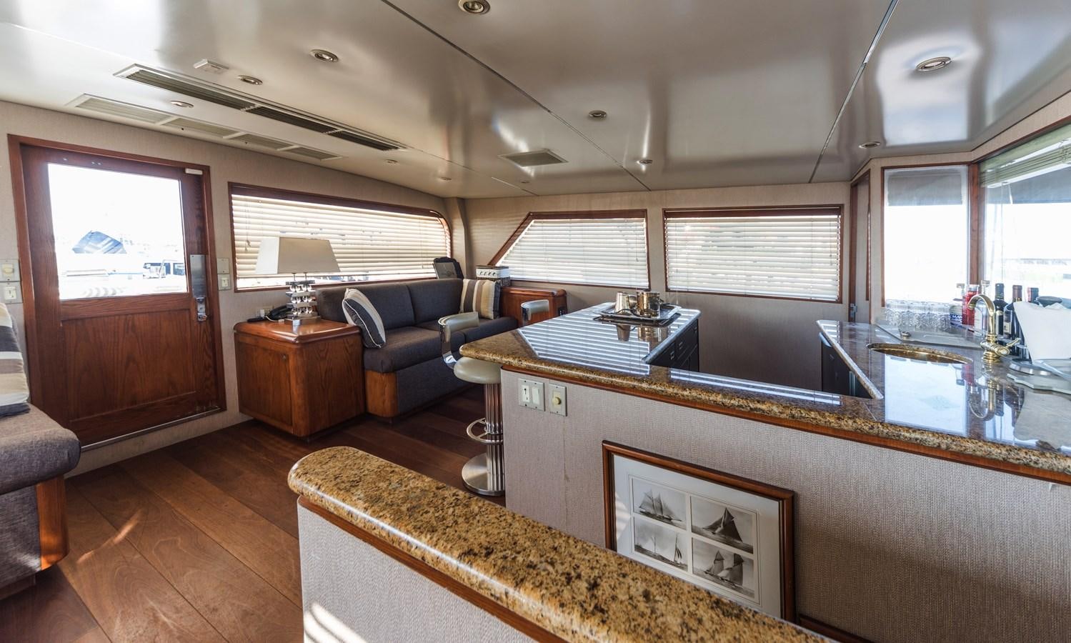 a living room with a large window aboard SU Yacht for Sale