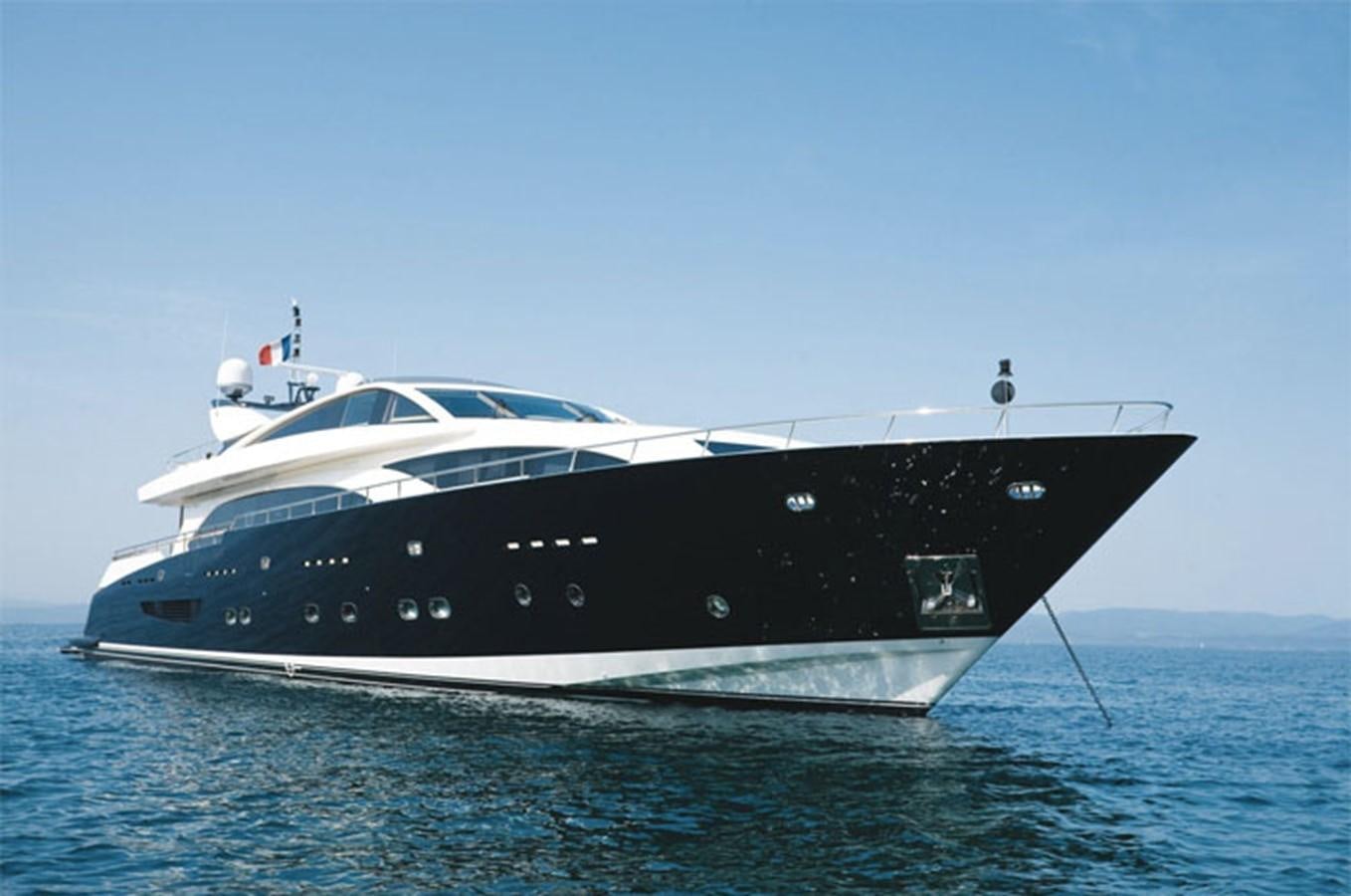 a large black and white yacht aboard COUACH 120 Yacht for Sale