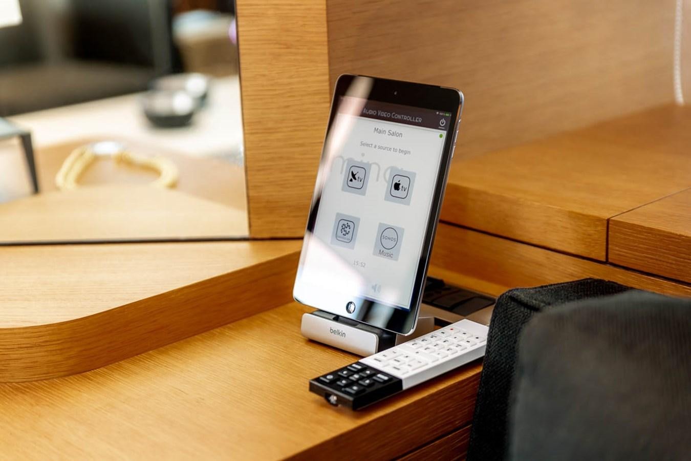 a cell phone on a desk aboard MINA Yacht for Sale