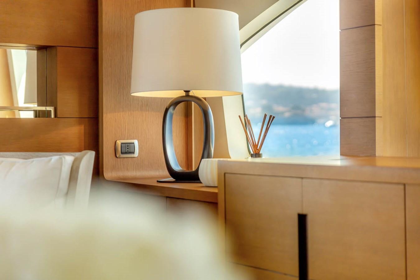 a lamp on a table aboard MINA Yacht for Sale