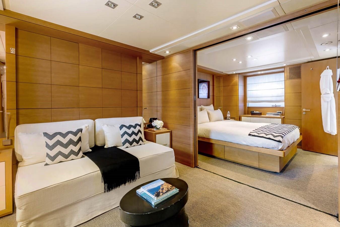 a room with a bed and a desk aboard MINA Yacht for Sale