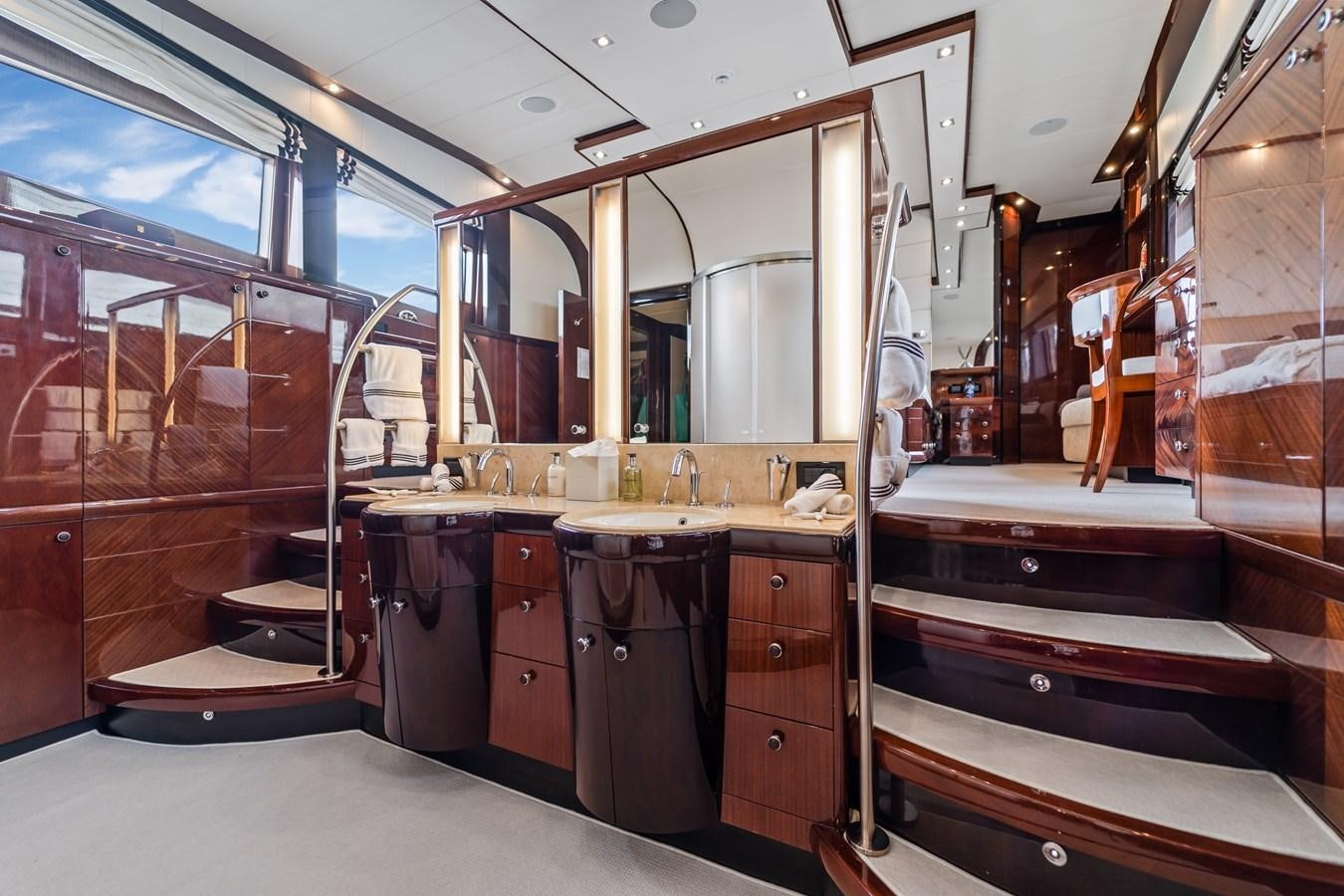 a bathroom with a large mirror aboard MY HAPPY HOUR Yacht for Sale