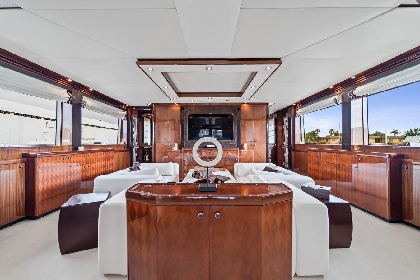 a room with a bed and a desk aboard MY HAPPY HOUR Yacht for Sale