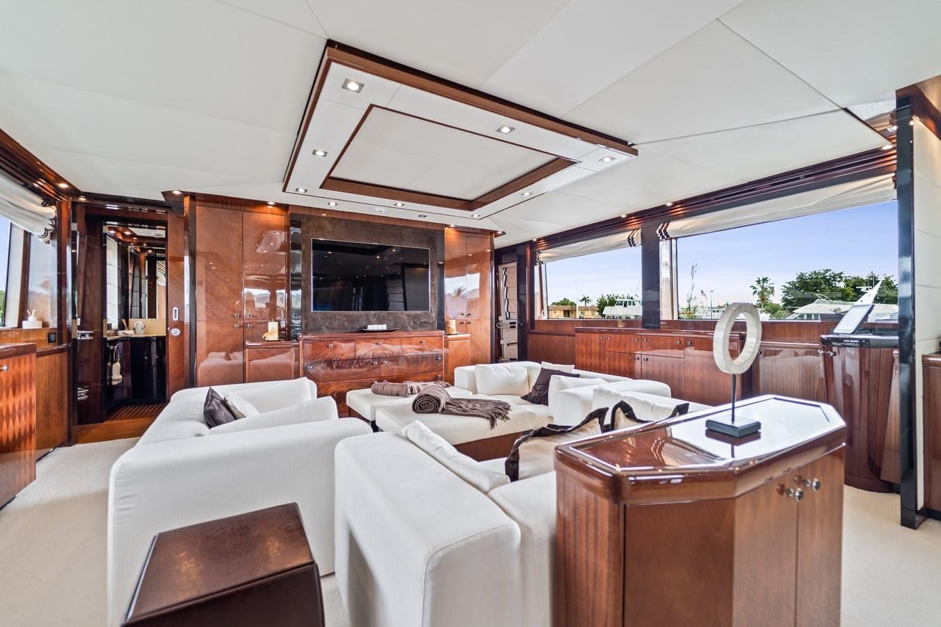 a room with a bed and a desk aboard MY HAPPY HOUR Yacht for Sale