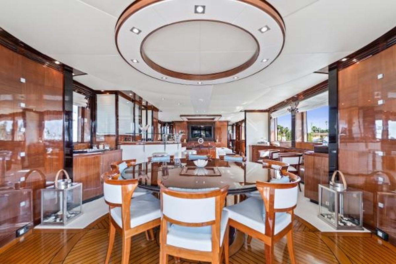 a large kitchen with wooden cabinets aboard MY HAPPY HOUR Yacht for Sale