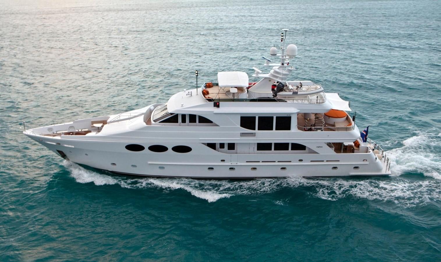 a white boat on the water aboard NO NAME  2002 120 TRI-DECK M/Y Yacht for Sale