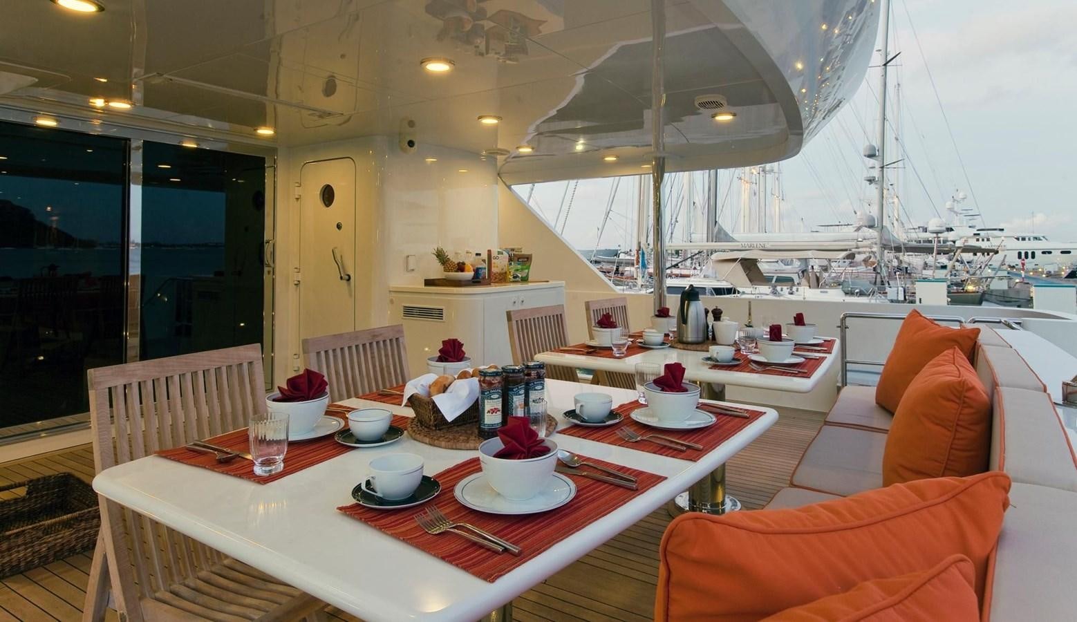 a table with food on it aboard NO NAME  2002 120 TRI-DECK M/Y Yacht for Sale